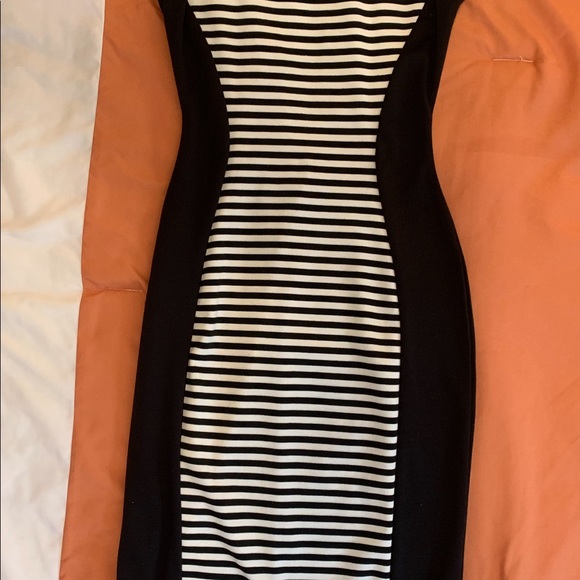 Black and White Form Fitting Material Girl Dress - Picture 4 of 10